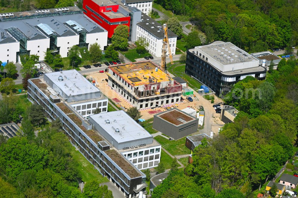 Berlin from the bird's eye view: Construction site for the new building of a research building and office complex Imaging Innovation Center of Max Delbrueck Centers on street Robert-Roessle-Strasse in the district Buch in Berlin, Germany