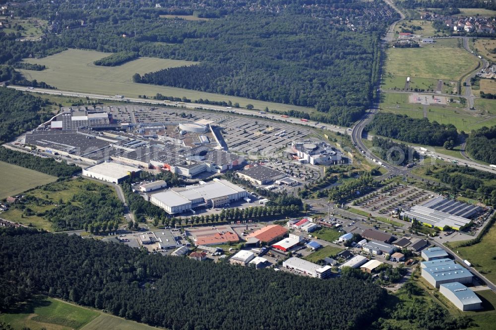 Aerial image Wildau - The A10 German shopping mall center of the shop with the euro by the ECE after a long freeze implemented extension A10 Triangle