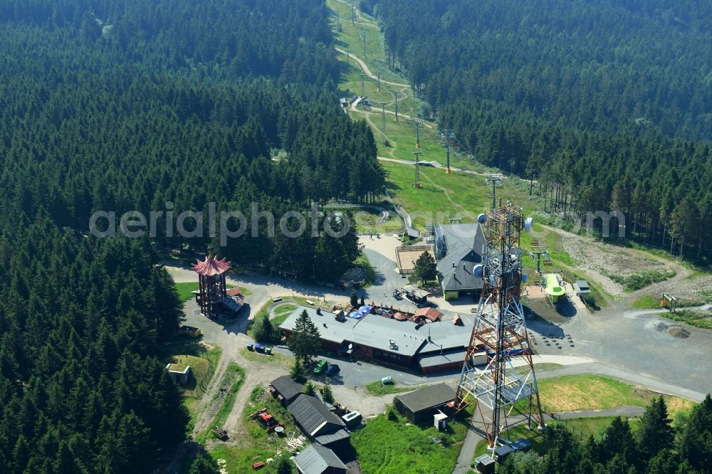 Hahnenklee from the bird's eye view: Mountain slope with downhill ski slope and cable car - lift on Bocksberg in Hahnenklee in the state Lower Saxony, Germany
