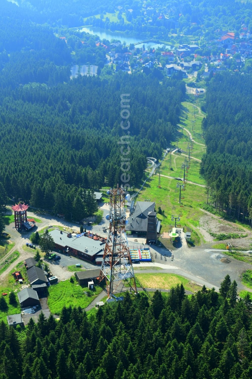 Aerial photograph Hahnenklee - Mountain slope with downhill ski slope and cable car - lift on Bocksberg in Hahnenklee in the state Lower Saxony, Germany