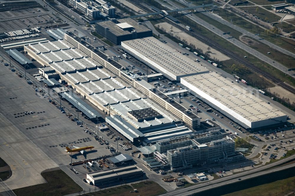 Aerial image München-Flughafen - Parking spaces, apron and logistics areas at the handling buildings and freight terminals on the grounds of the airport in Munich-airport in the state Bavaria, Germany