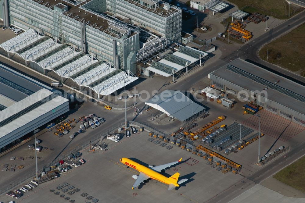 München-Flughafen from above - Parking spaces, apron and logistics areas at the handling buildings and freight terminals on the grounds of the airport in Munich-airport in the state Bavaria, Germany
