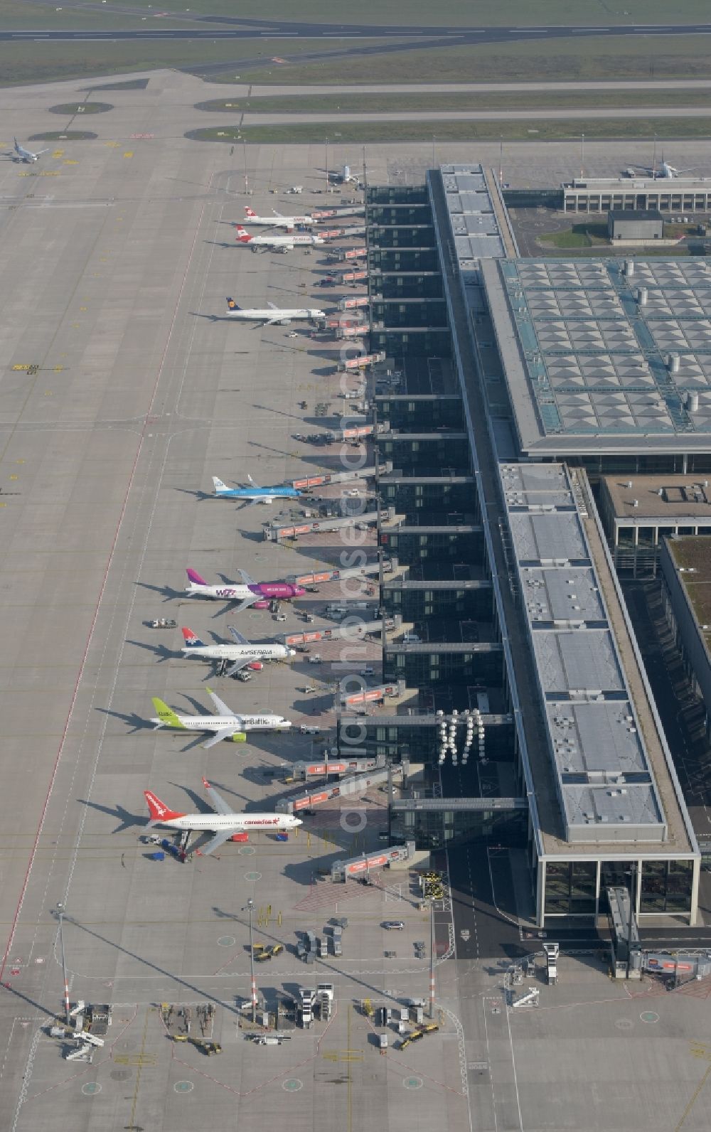 Schönefeld from above - Handling building and Terminals 1 on the grounds of Berlin Brandenburg Willy Brandt Airport, an international commercial airport in Schoenefeld in the federal state of Brandenburg, Germany