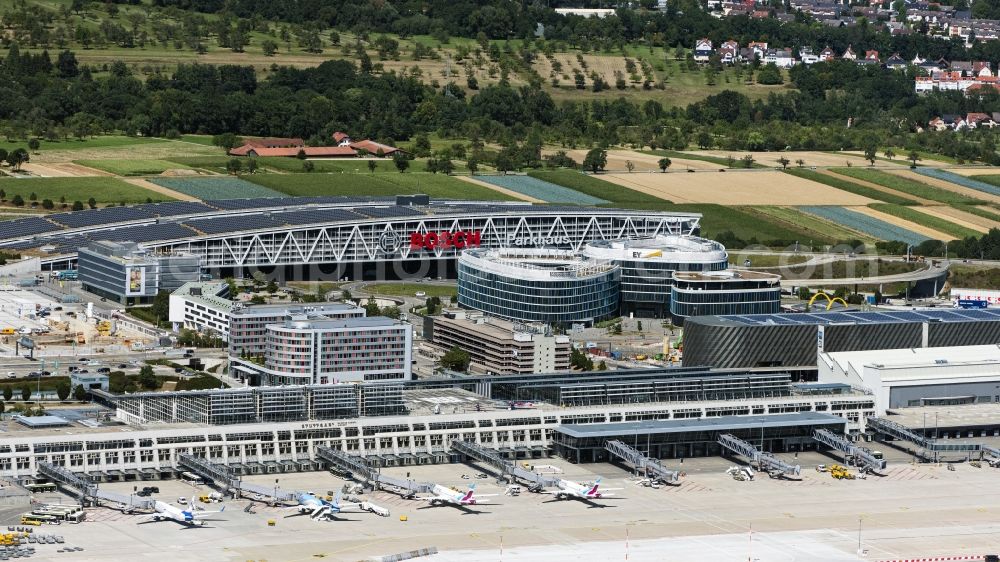 Stuttgart from the bird's eye view: Dispatch building and terminals on the premises of the airport in Stuttgart in the state Baden-Wurttemberg, Germany