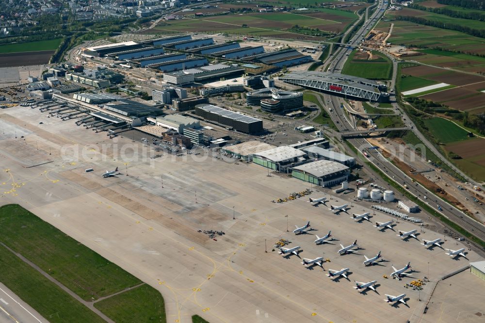 Stuttgart from the bird's eye view: Dispatch building and terminals on the premises of the airport in Stuttgart in the state Baden-Wuerttemberg, Germany
