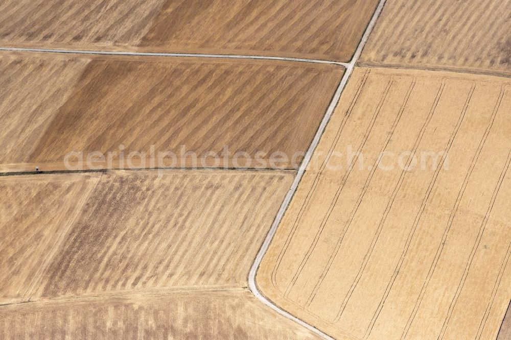 Aerial photograph Güntersleben - Field structures of a harvested grain field in Guentersleben in the state Bavaria, Germany