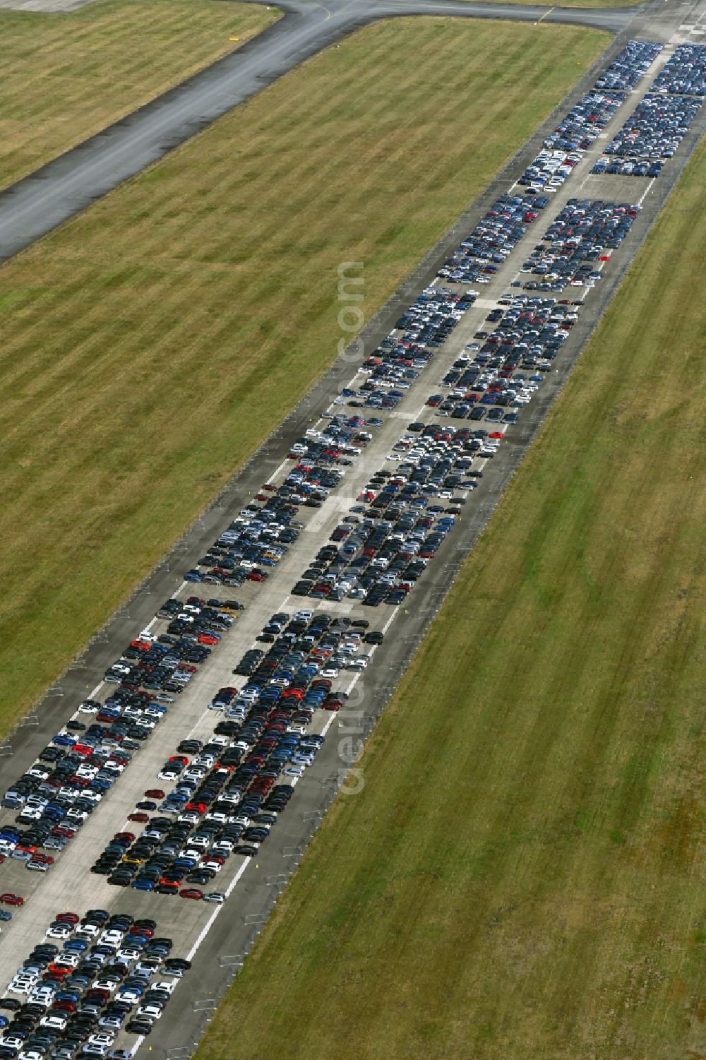 Aerial photograph Parchim - Cars parked on the runway of the airport in Parchim in the state Mecklenburg-Western Pomerania, Germany