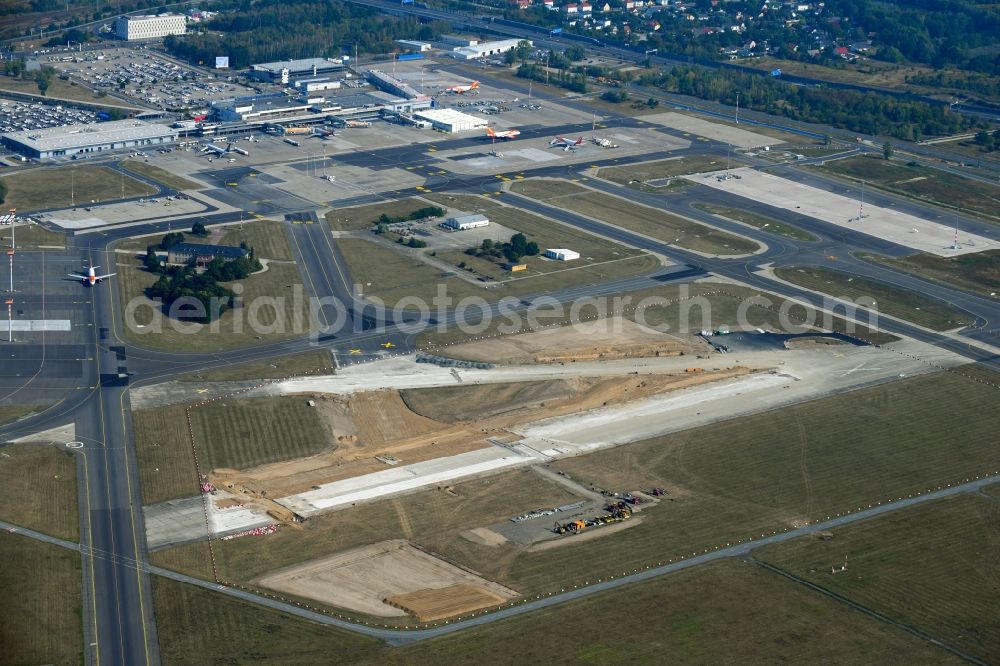 Aerial image Schönefeld - Demolition and unsealing work on the concrete surfaces of old runway in Schoenefeld in the state Brandenburg, Germany