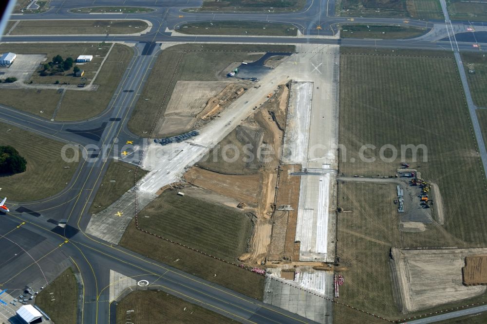 Aerial photograph Schönefeld - Demolition and unsealing work on the concrete surfaces of old runway in Schoenefeld in the state Brandenburg, Germany