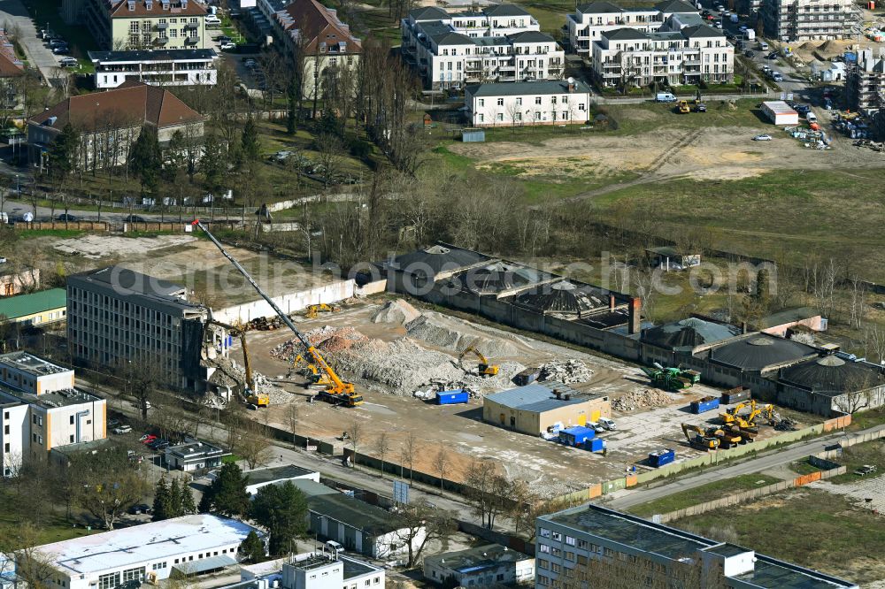 Aerial image Berlin - Demolition and clearing work on the building complex of the former military barracks for property development for the new building project of the garden city on Koepenicker Allee - Am Alten Flugplatz in the district Karlshorst in Berlin, Germany
