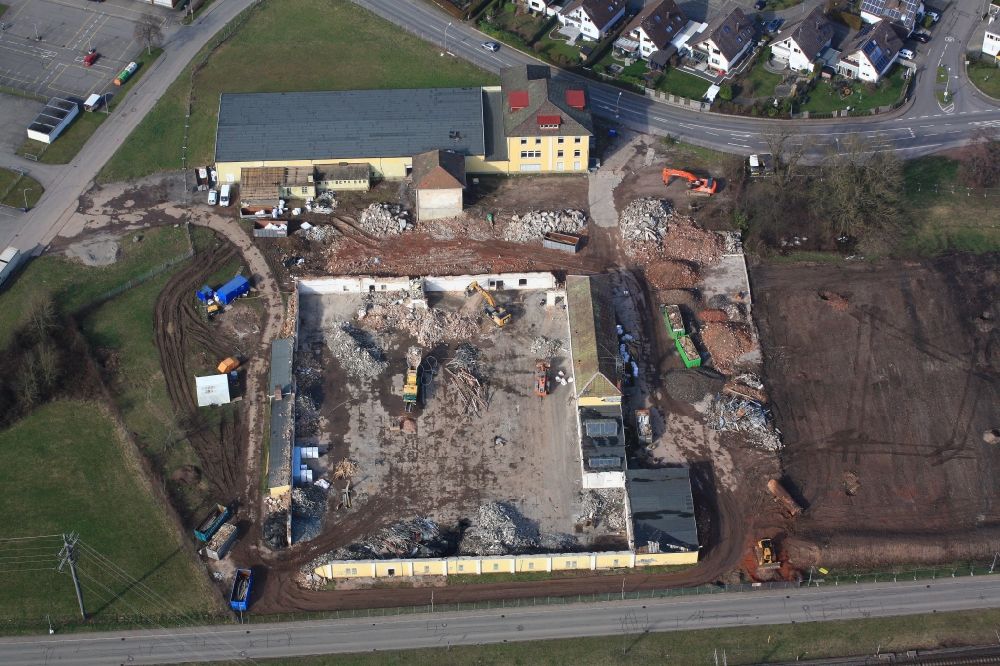 Aerial photograph Steinen - Demolition work on the site of the former Quelle Areal in Steinen in the state Baden-Wuerttemberg. The former industrial site gets a new development plan and will be utilized as a commercial area, a residential area and a mixed area