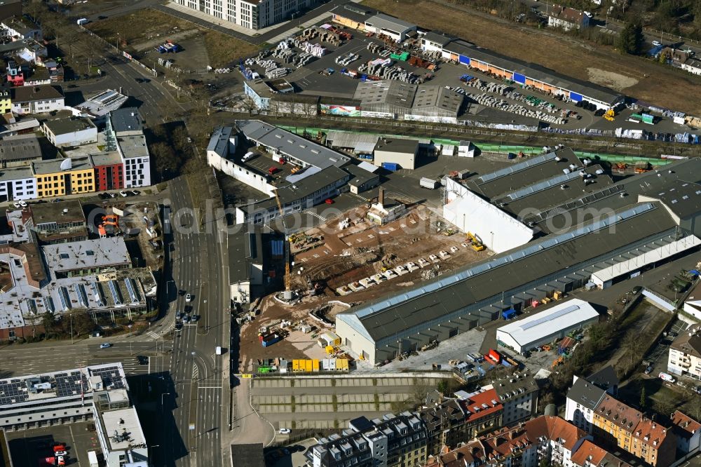 Kassel from the bird's eye view: Demolition surface and extension - new building - construction site on the factory premises of Krauss-Maffei Wegmann GmbH & Co. KG on Wolfhager Strasse in the district Nord (Holland) in Kassel in the state Hesse, Germany