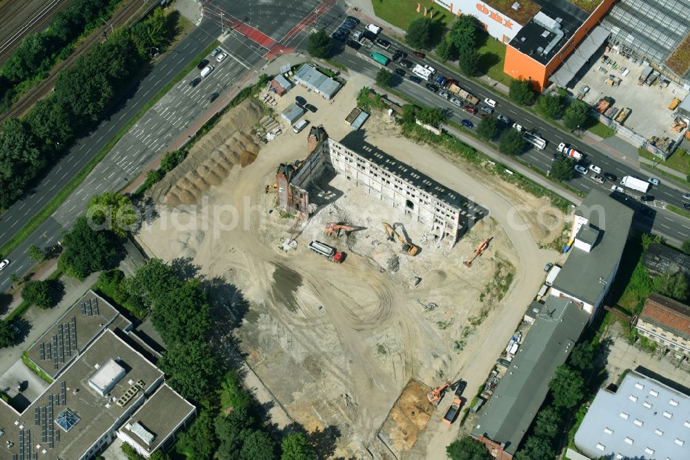 Aerial image Berlin - Demolition site of the ruins of the factory building of the former BaerenSiegel distillery on Adlergestell in Adlershof, Berlin. At the construction site of the distinctive production building GDR times development a shopping center