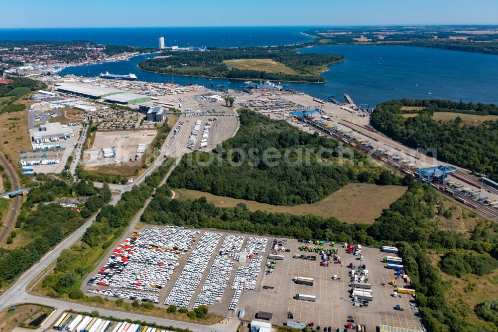Travemünde from the bird's eye view: Outdoor storage space for new cars - automobiles - cars in Travemuende at the baltic coast in the state Schleswig-Holstein, Germany