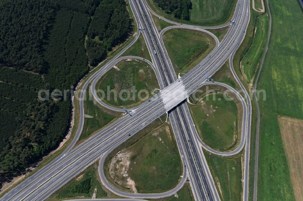 Wöbbelin from the bird's eye view: Site of the highway triangle Schwerin on the motorway BAB A14 and A24 at Woebbelin in Mecklenburg - Western Pomerania