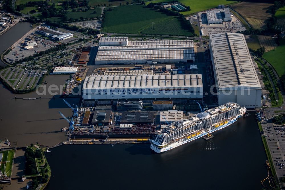 Aerial image Papenburg - Cruise ship AIDAcosma on the shipyard of the Meyer Werft in Papenburg in the state Lower Saxony, Germany