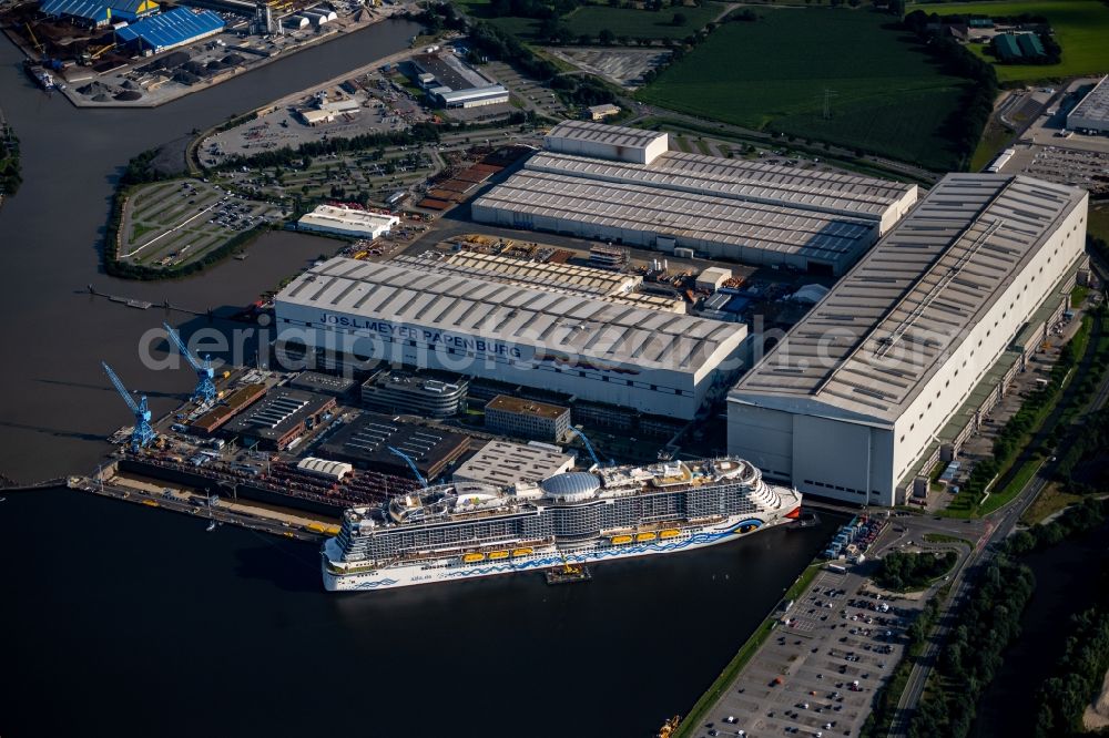 Aerial photograph Papenburg - Cruise ship AIDAcosma on the shipyard of the Meyer Werft in Papenburg in the state Lower Saxony, Germany