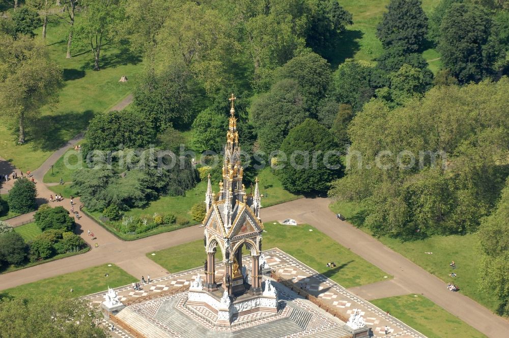 Aerial image London - View of the Albert Memorial in Kensington Gardens in London. The Albert Memorial was commissioned by Queen Victoria of Great Britain and Ireland in memory of Albert of Saxe-Coburg and Gotha in order. It was built by Sir George Gilbert Scott in the years 1864-1875 in the Gothic Revival style