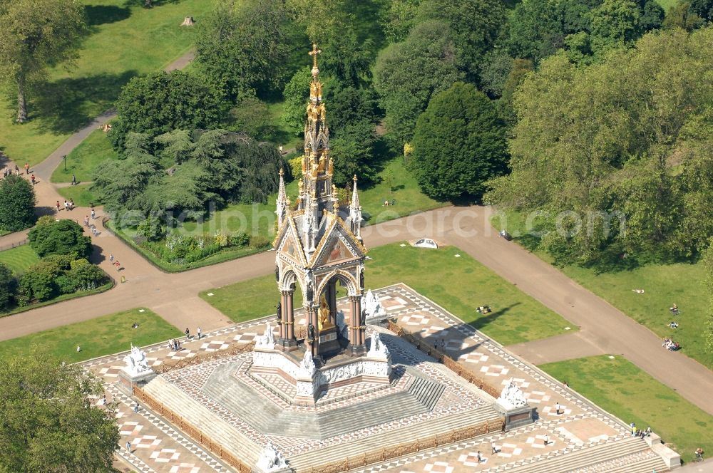 Aerial photograph London - View of the Albert Memorial in Kensington Gardens in London. The Albert Memorial was commissioned by Queen Victoria of Great Britain and Ireland in memory of Albert of Saxe-Coburg and Gotha in order. It was built by Sir George Gilbert Scott in the years 1864-1875 in the Gothic Revival style
