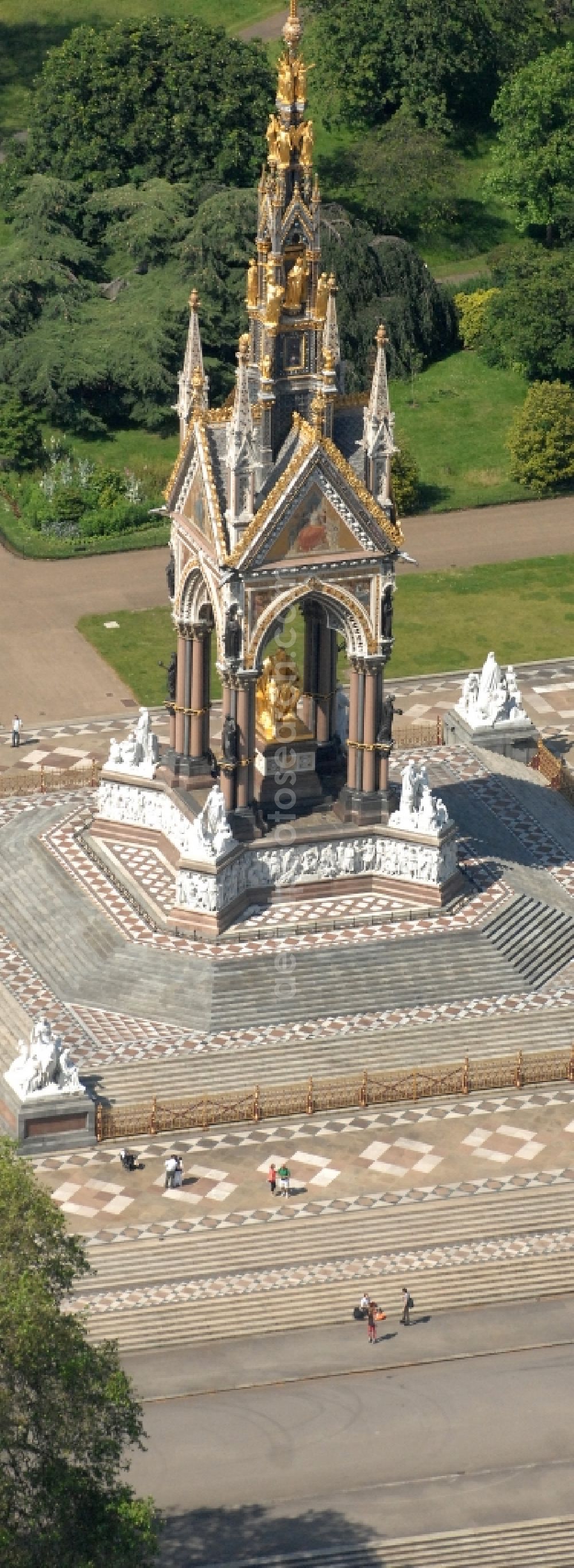 London from above - View of the Albert Memorial in Kensington Gardens in London. The Albert Memorial was commissioned by Queen Victoria of Great Britain and Ireland in memory of Albert of Saxe-Coburg and Gotha in order. It was built by Sir George Gilbert Scott in the years 1864-1875 in the Gothic Revival style