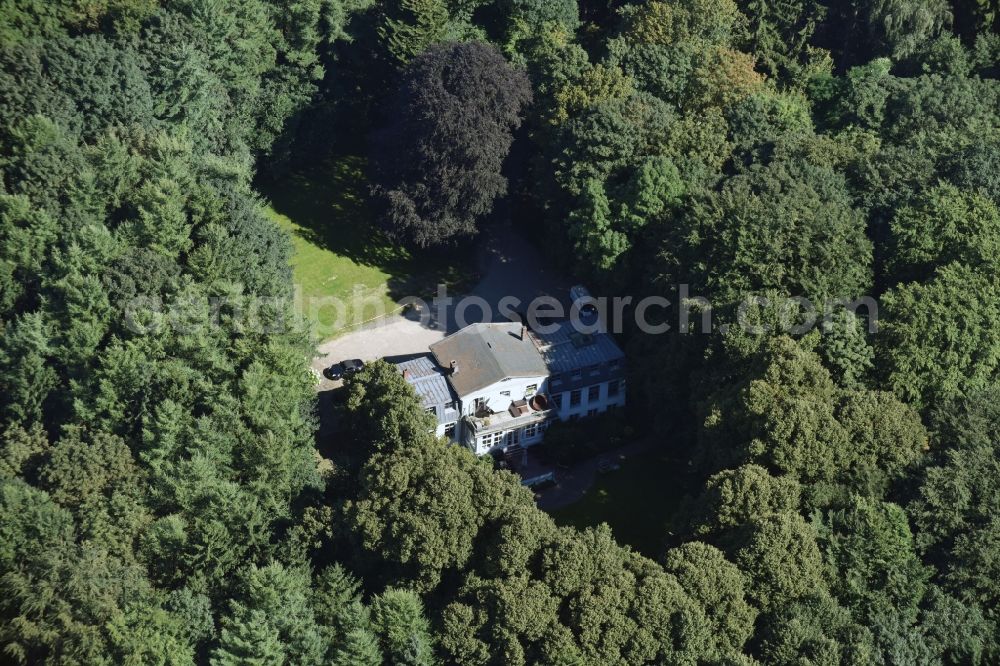 Reinbek from the bird's eye view: Detached House in a remote , lonely forest settlement in Reinbek in Schleswig - Holstein