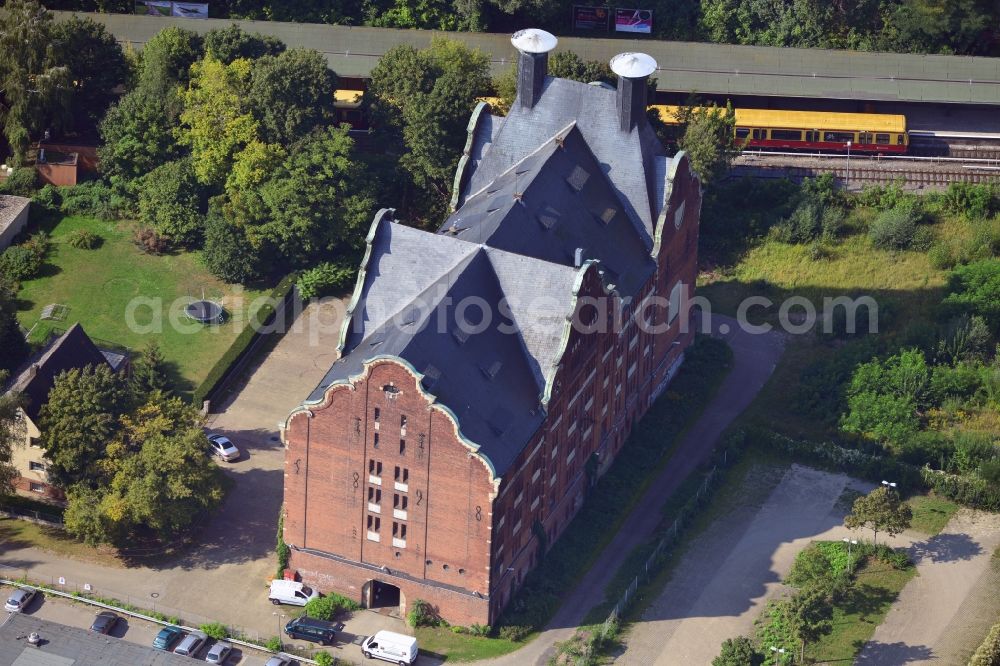 Berlin from above - View to old malthouse of the former Schöneberger Castle Brewery in the Stein street in the local part Lichtenrade in the district Tempelhof-Schöneberg in Berlin. After the brewery had finished the malting operation, the monument protected building is used as a public warehouse