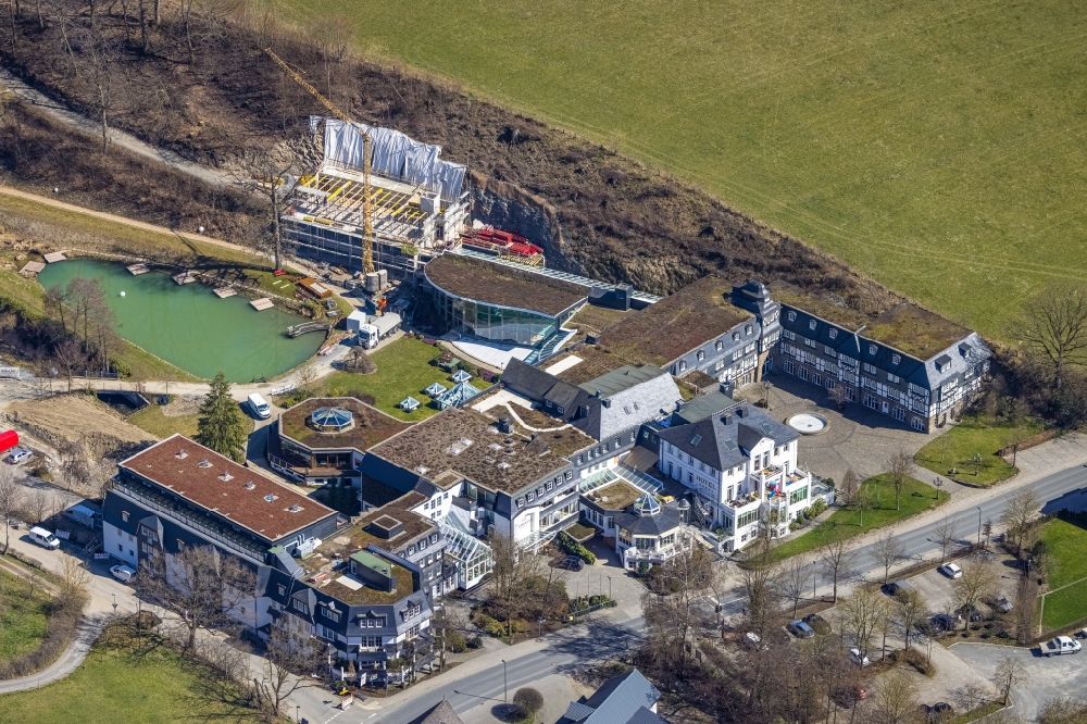 Winkhausen from the bird's eye view: Reconstruction and revitalization on the extension construction site of the hotel complex Romantik- & Wellnesshotel Deimann in Winkhausen at Sauerland in the state North Rhine-Westphalia, Germany