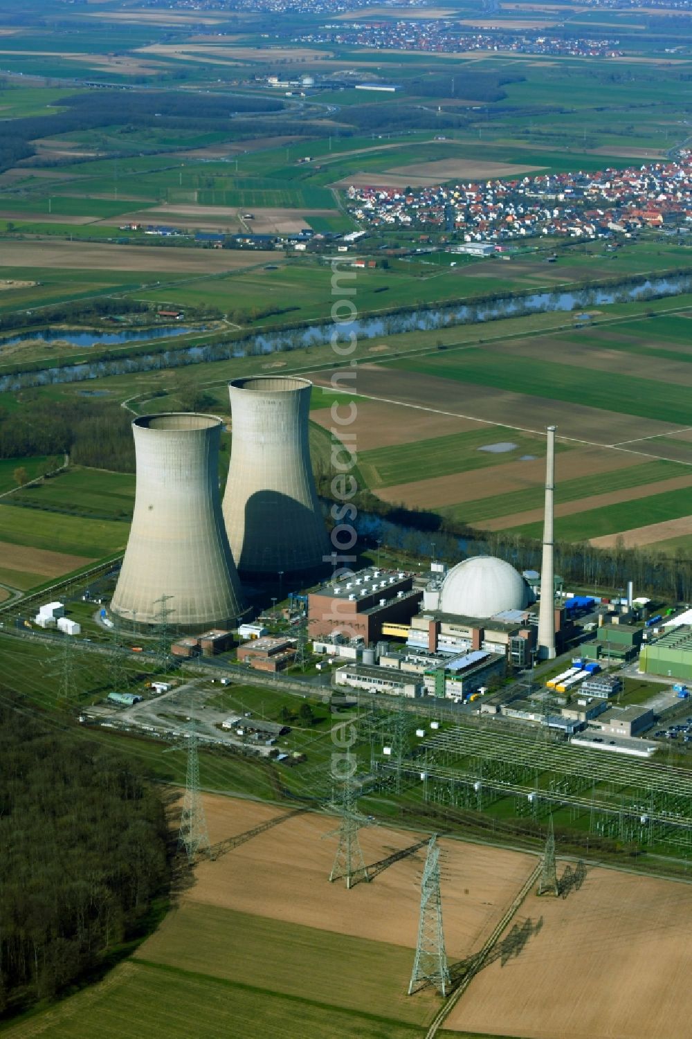 Grafenrheinfeld from above - Reactor blocks, cooling tower structures and plants of the nuclear power plant - nuclear power plant AKW - KKW in Grafenrheinfeld in the state Bavaria, Germany