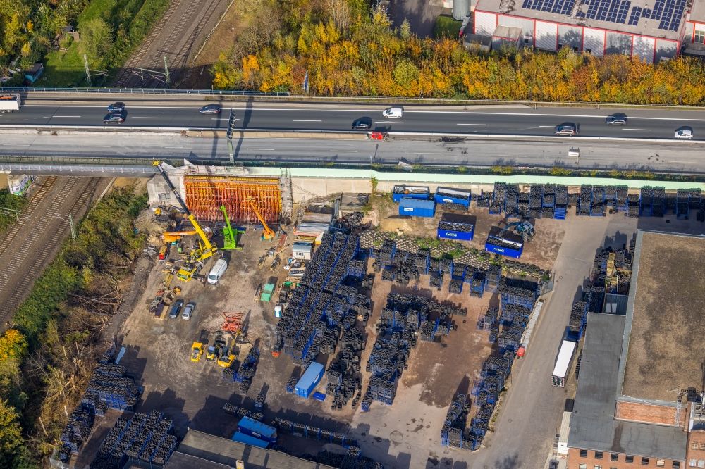 Aerial photograph Witten - Motorway construction site to renew the asphalt surface on the route of the A40 with repair work after a major fire of the local tire store in the district Hamme in Witten at Ruhrgebiet in the state North Rhine-Westphalia, Germany