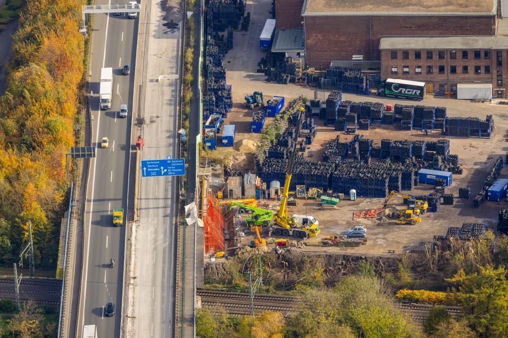 Witten from the bird's eye view: Motorway construction site to renew the asphalt surface on the route of the A40 with repair work after a major fire of the local tire store in the district Hamme in Witten at Ruhrgebiet in the state North Rhine-Westphalia, Germany