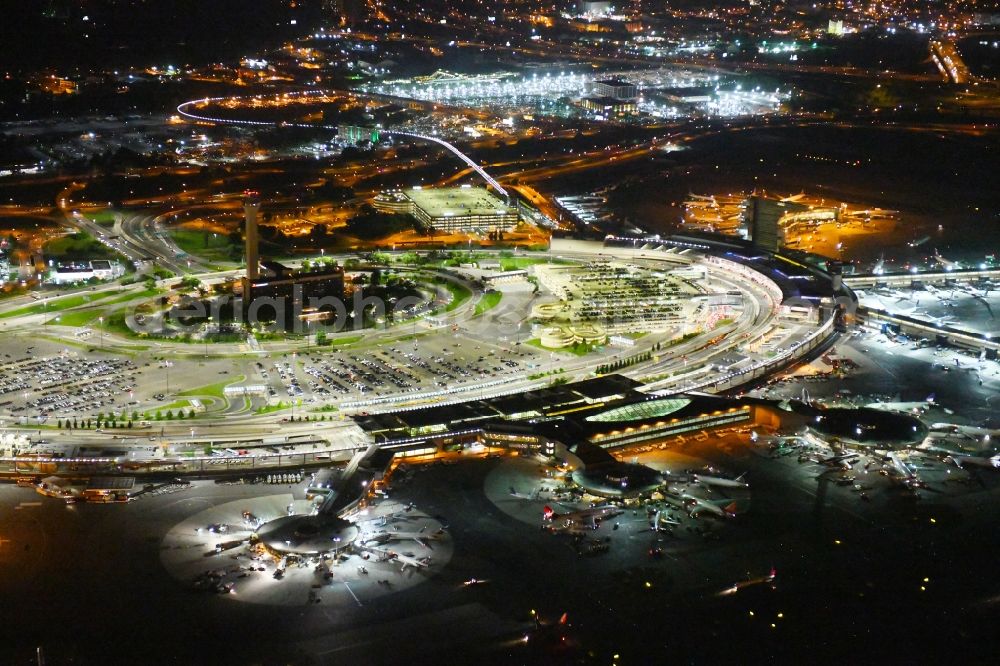 Newark at night from above - Night lighting Dispatch building and terminals on the premises of the airport Newark Liberty International Airport in Newark in New Jersey, United States of America