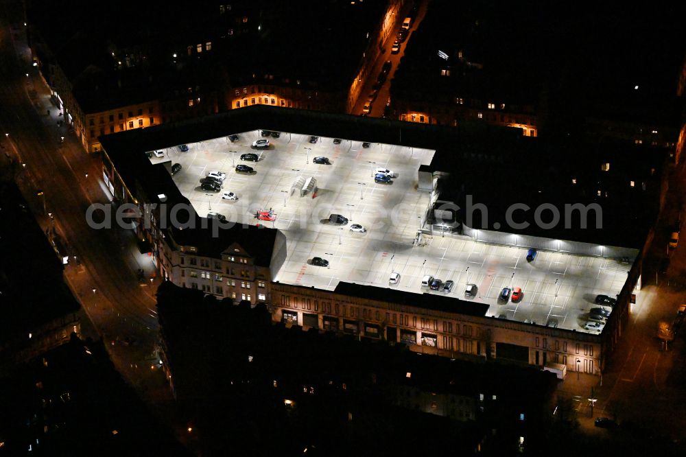 Aerial photograph at night Leipzig - Night lighting parking space for parked cars at the shopping center Kaufland Leipzig-Altlindenau in the district Altlindenau in Leipzig in the state Saxony, Germany