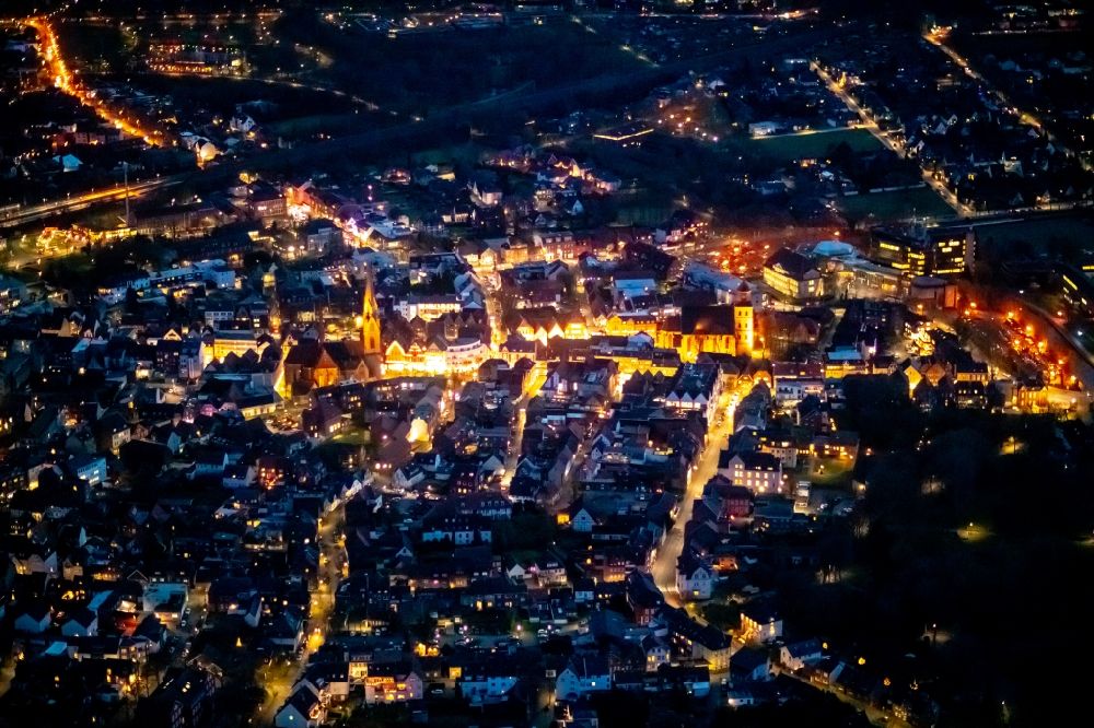 Ahlen at night from above - Night lighting old Town area and city center in Ahlen in the state North Rhine-Westphalia, Germany