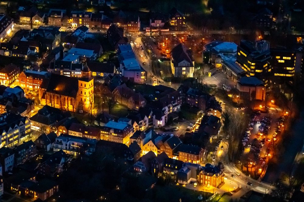 Ahlen at night from the bird perspective: Night lighting old Town area and city center in Ahlen in the state North Rhine-Westphalia, Germany
