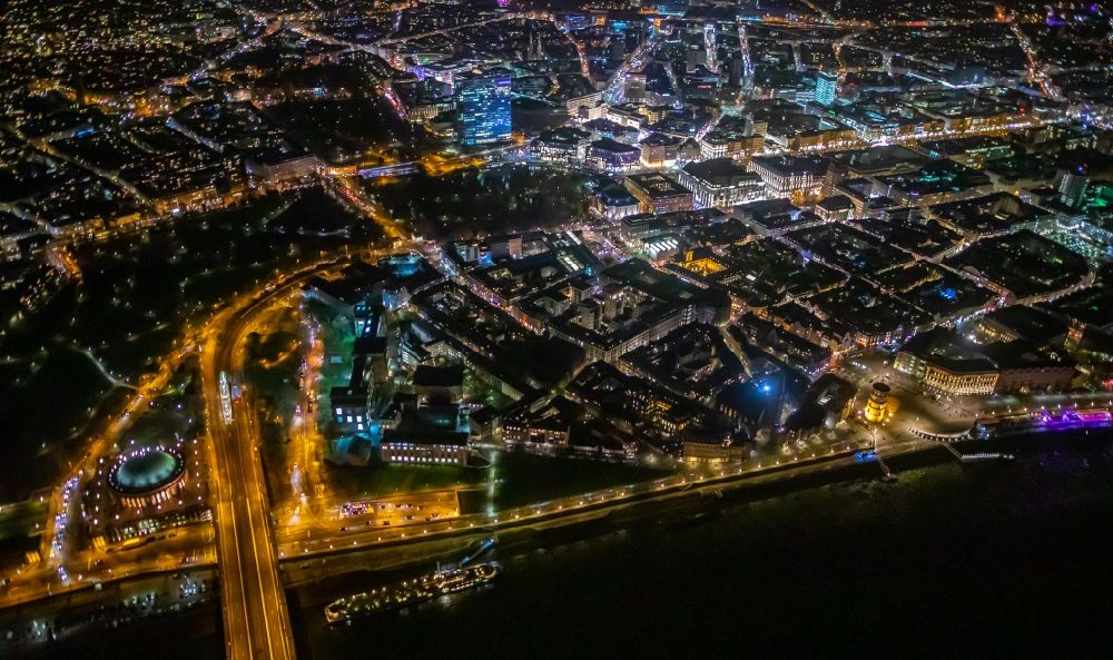Aerial image at night Düsseldorf - Night lighting old Town area and city center - Carlstadt on rhine river in Duesseldorf in the state North Rhine-Westphalia, Germany