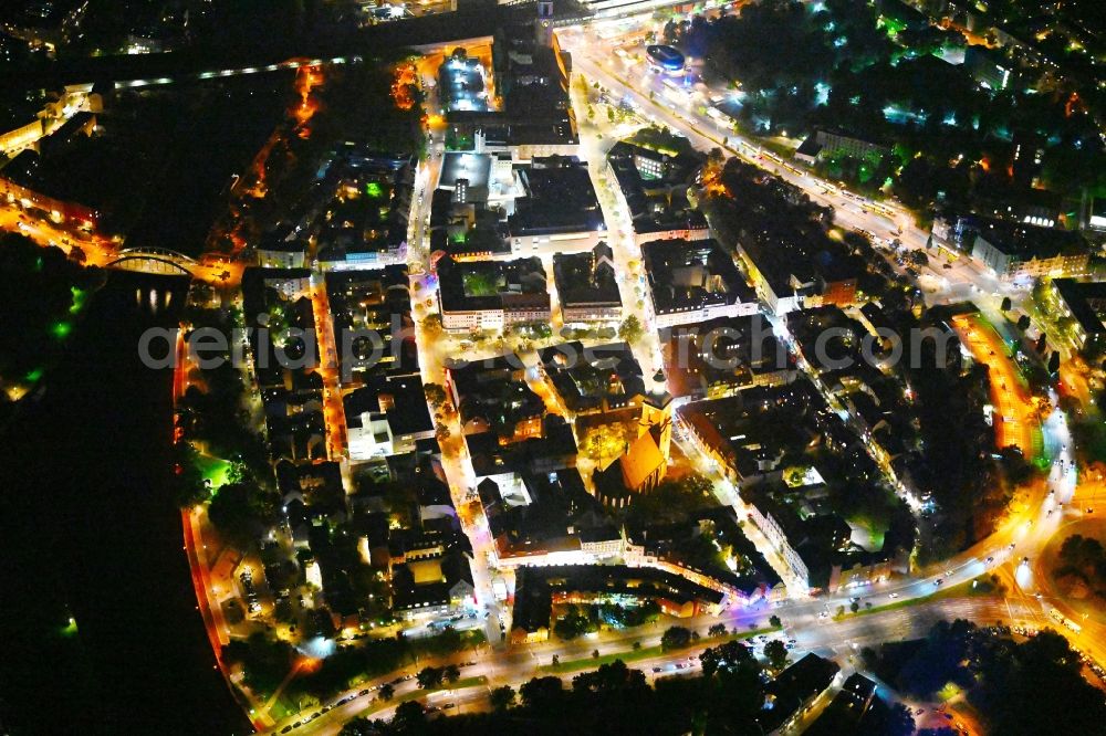 Aerial photograph at night Berlin - Night lighting old Town area and city center Spandau in the district Spandau in Berlin, Germany