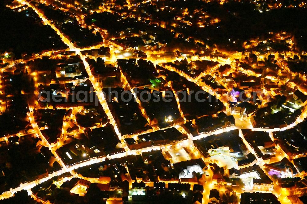 Aerial image at night Wernigerode - Night lighting old Town area and city center in Wernigerode in the state Saxony-Anhalt, Germany