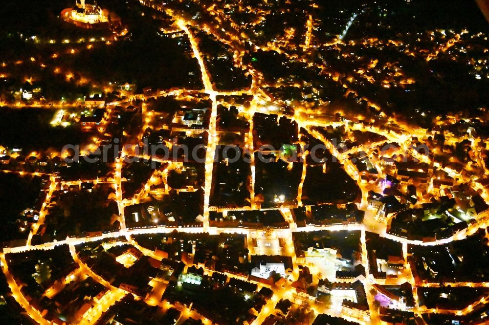 Wernigerode at night from above - Night lighting old Town area and city center in Wernigerode in the state Saxony-Anhalt, Germany