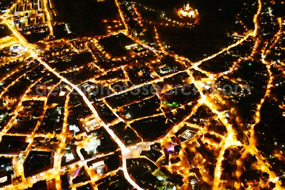 Aerial image at night Wernigerode - Night lighting old Town area and city center in Wernigerode in the state Saxony-Anhalt, Germany