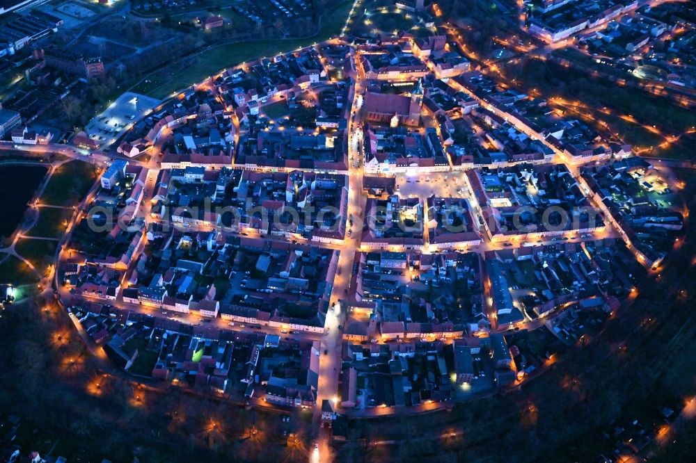 Aerial image at night Wittstock/Dosse - Night lighting old Town area and city center in Wittstock/Dosse in the state Brandenburg, Germany