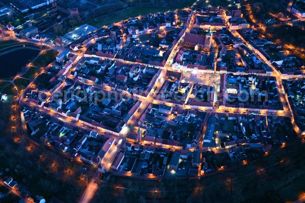 Wittstock/Dosse at night from above - Night lighting old Town area and city center in Wittstock/Dosse in the state Brandenburg, Germany