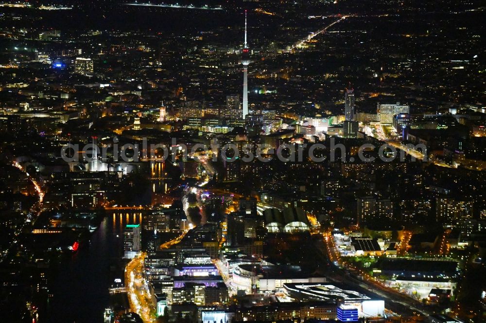 Aerial photograph at night Berlin - Night lighting building on Anschutz- Areal along of Muehlenstrasse in the district Friedrichshain in Berlin, Germany