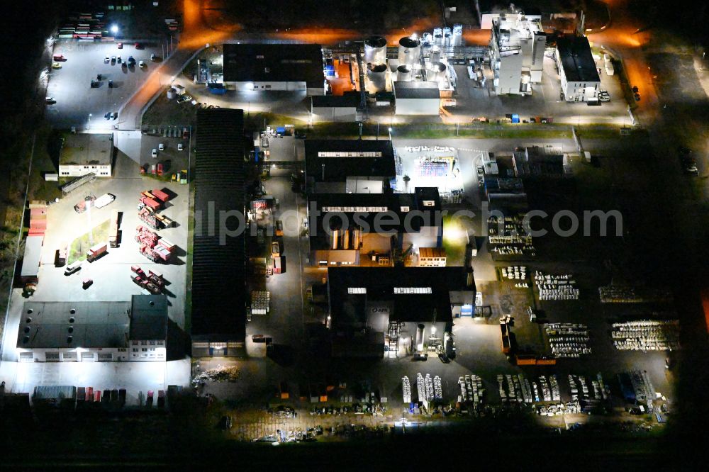 Aerial image at night Merseburg - Night lighting industrial estate and company settlement on street Beunaer Strasse in Merseburg in the state Saxony-Anhalt, Germany