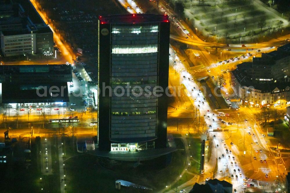 Aerial image at night Düsseldorf - Night lighting office and administration buildings ARAG-Tower of the insurance company ARAG SE in Duesseldorf in the state North Rhine-Westphalia