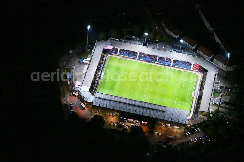 Osnabrück at night from the bird perspective: Night lighting Sports facility grounds of the Arena - stadium in the district Schinkel in Osnabrueck in the state Lower Saxony, Germany