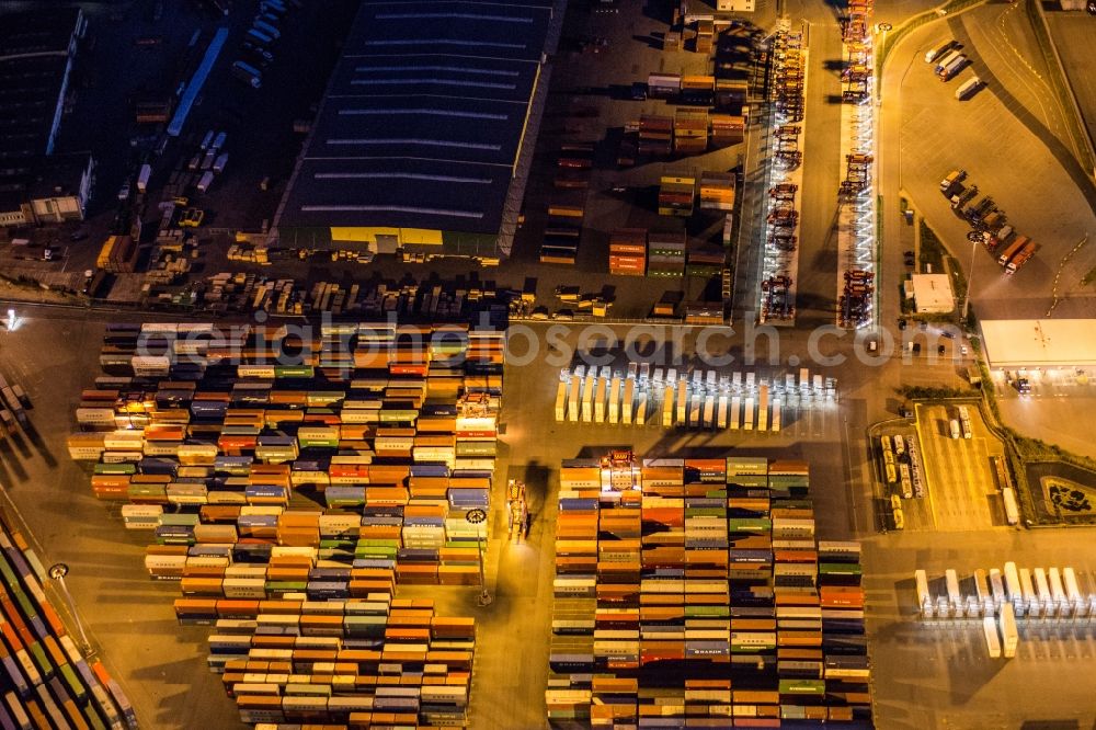 Hamburg at night from above - Night aerial view on loading and unloading of containers at the port of Hamburg in Hamburg