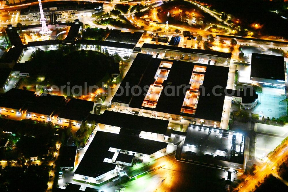 Aerial photograph at night Berlin - Night lighting exhibition grounds and exhibition halls on Messedamm - Kongresszentrum ICC in the district Charlottenburg in Berlin, Germany