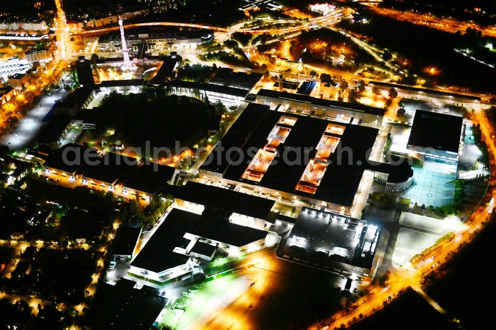 Aerial image at night Berlin - Night lighting exhibition grounds and exhibition halls on Messedamm - Kongresszentrum ICC in the district Charlottenburg in Berlin, Germany