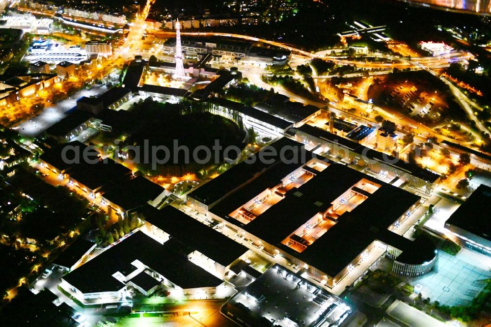 Berlin at night from above - Night lighting exhibition grounds and exhibition halls on Messedamm - Kongresszentrum ICC in the district Charlottenburg in Berlin, Germany