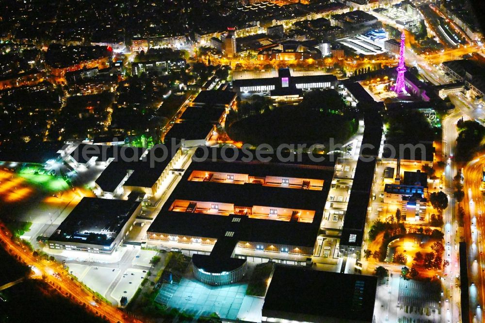 Berlin at night from above - Night lighting exhibition grounds and exhibition halls on Messedamm - Kongresszentrum ICC in the district Charlottenburg in Berlin, Germany